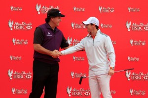 14-01-14 European Tour 2014, Abu Dhabi HSBC Golf Championship, Abu Dhabi Golf Club, Abu Dhabi, United Arab Emirates. 16-19 Jan. Phil  Mickelson of United States shake hands with Rory McIlroy at a photocall ahead of the Abu Dhabi HSBC Golf Championship.