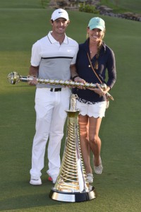 22/11/2015 European Tour 2015, Race to Dubai: DP World Tour Championship, Jumeirah Golf Estates, Dubai, United Arab Emirates. 19-22 nov Rory  McIlroy of Northern Ireland the winner with the trophees and his girlfriend Erica Stoll