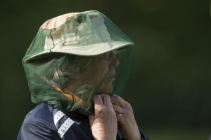 02-06-2012 Ladies European Tour 2012, Deloitte Ladies Open, Golfclub Broekpolder, Rotterdam, The Netherlands. 01-03 June. A volunteer with a mosquito net during the second round.